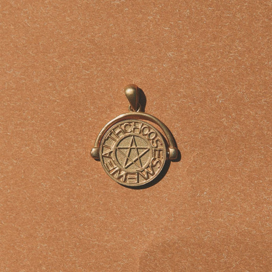 Yiru.jewellery pentacle signet pendant with engraved pentagram design on a sleek silver chain.