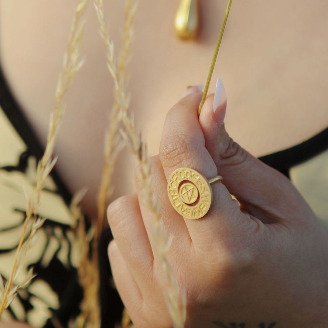 Silver pentacle signet ring by yiru.jewellery featuring a detailed pentagram design on a smooth band.