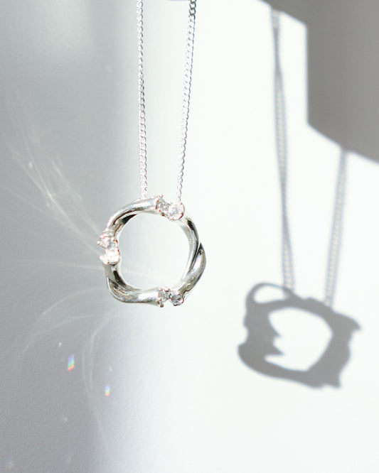Sterling silver loop necklace with organic design and crystal accents from yiru.jeweller