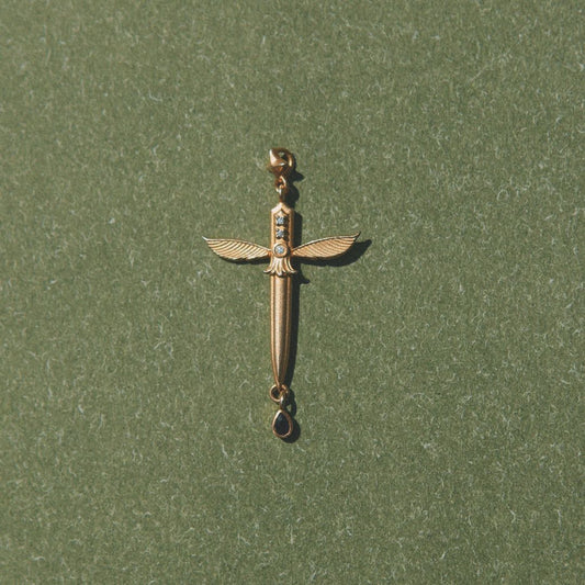 Yiru.jewellery Queen of Swords Tarot pendant featuring a detailed metal design with intricate tarot card imagery.