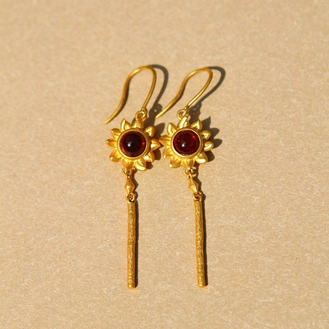 Yiru.jewellery Queen of Wands earrings featuring intricate gold and gemstone details, elegant and stylish jewelry accessory.