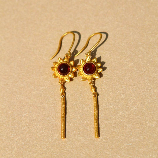 Yiru.jewellery Queen of Wands earrings featuring intricate gold and gemstone details, elegant and stylish jewelry accessory.