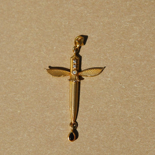 Queen of Swords Tarot pendant by yiru.jewellery featuring a detailed silver charm with tarot card design.