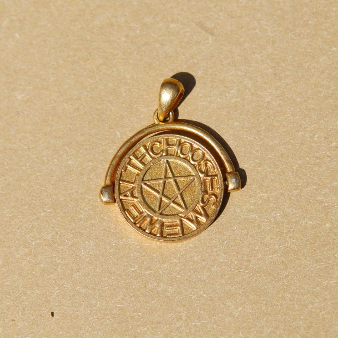 Yiru.jewellery pentacle signet pendant featuring a pentagram design on a polished metal surface.