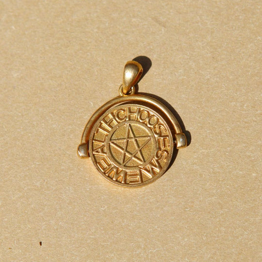 Yiru.jewellery pentacle signet pendant featuring a pentagram design on a polished metal surface.