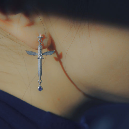 Yiru.jewellery Queen of Swords earrings with intricate silver design and gemstone accents, showcasing elegant jewelry craftsmanship.